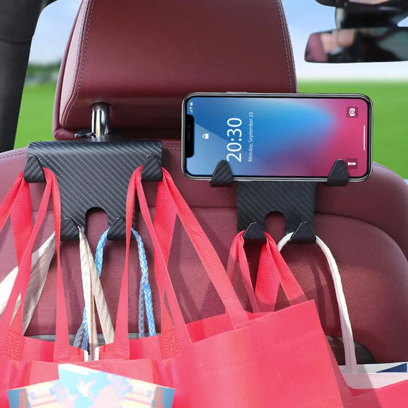 Black ABS plastic car multifunction hook and mobile phone holder bracket for rear seat storage.