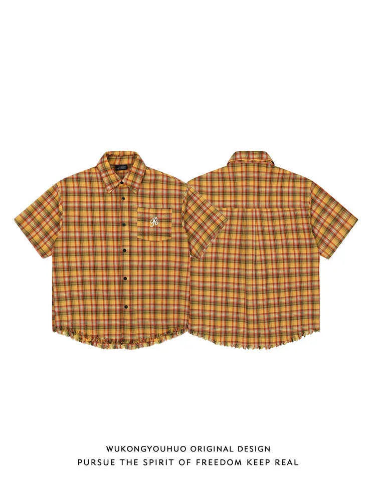 Yellow grid plaid shirt with embroidery pocket in loose-fit short sleeve design