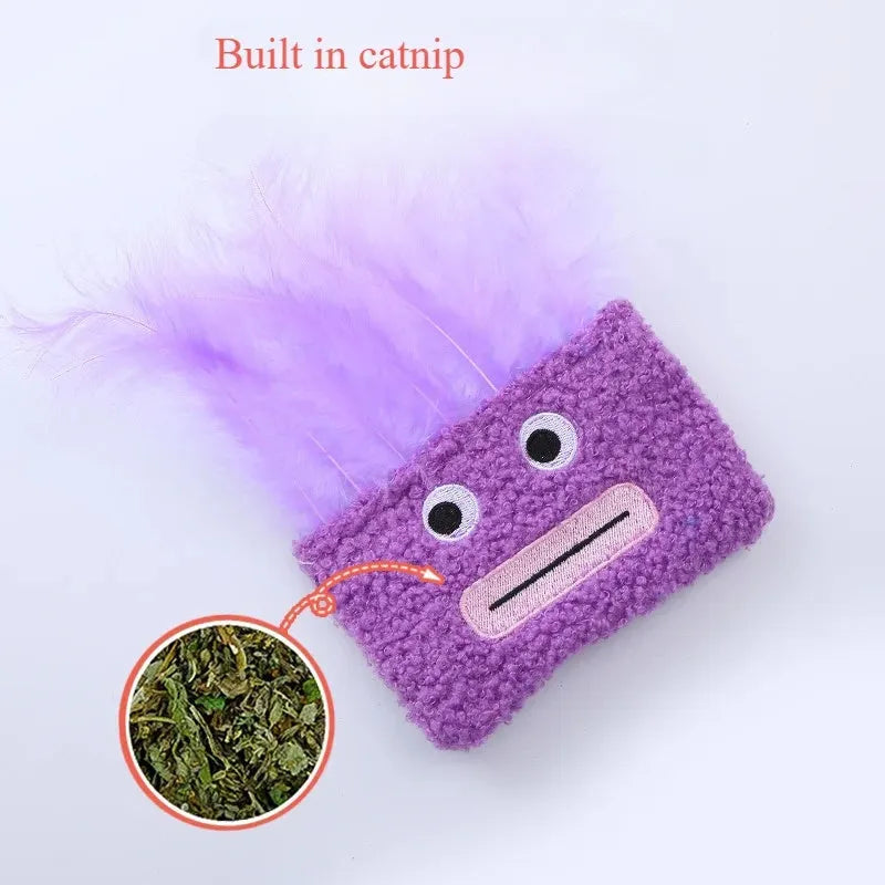 A funny big mouth explosion head shaped catnip plush toy shown in blue, green, orange, and purple colours.