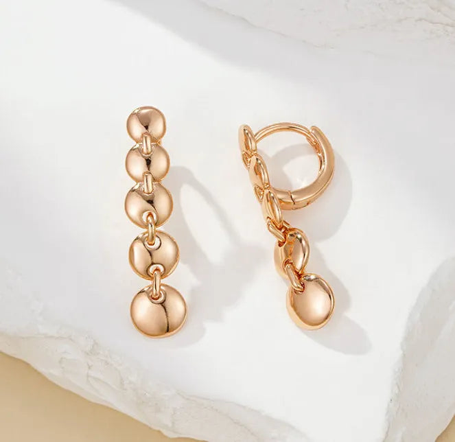 Gold retro woven circle earrings with geometric copper construction