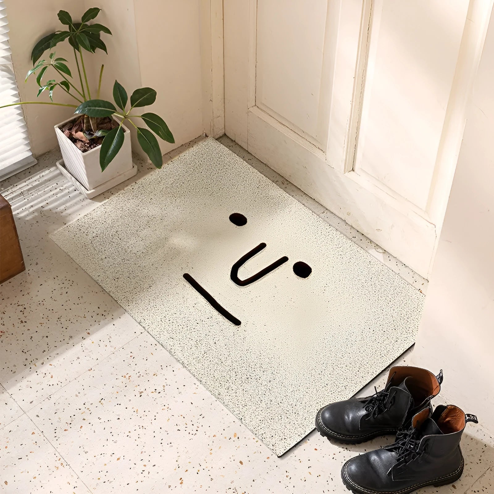 Square PVC floor mat with geometric pattern in Mr. Big Nose colour, shown on a home floor.