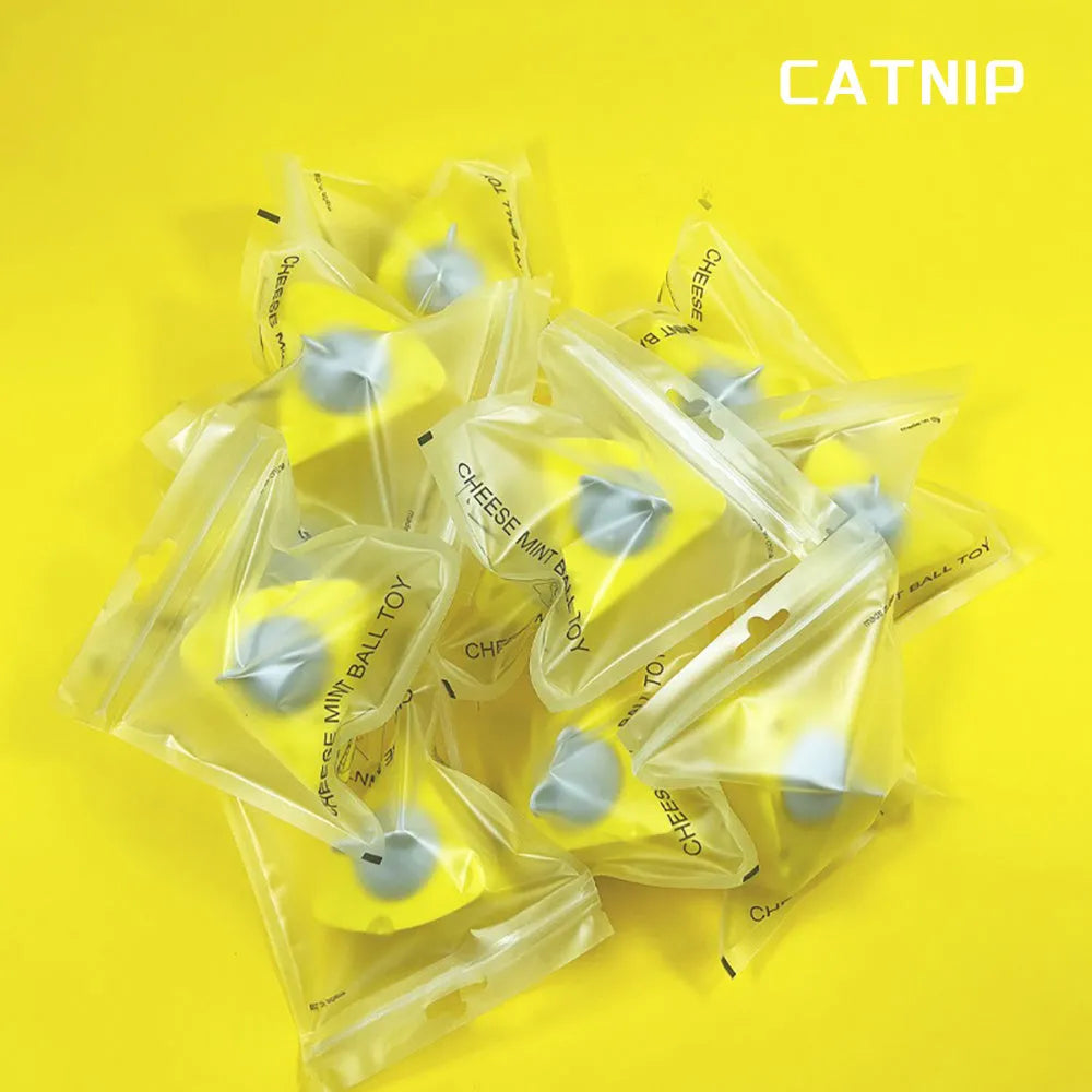 Yellow catnip and silvervine toy balls for cats to chew and play with