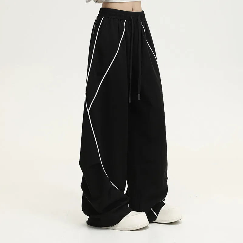 Black pleated wide-leg hip hop trousers with striped pattern and loose fit
