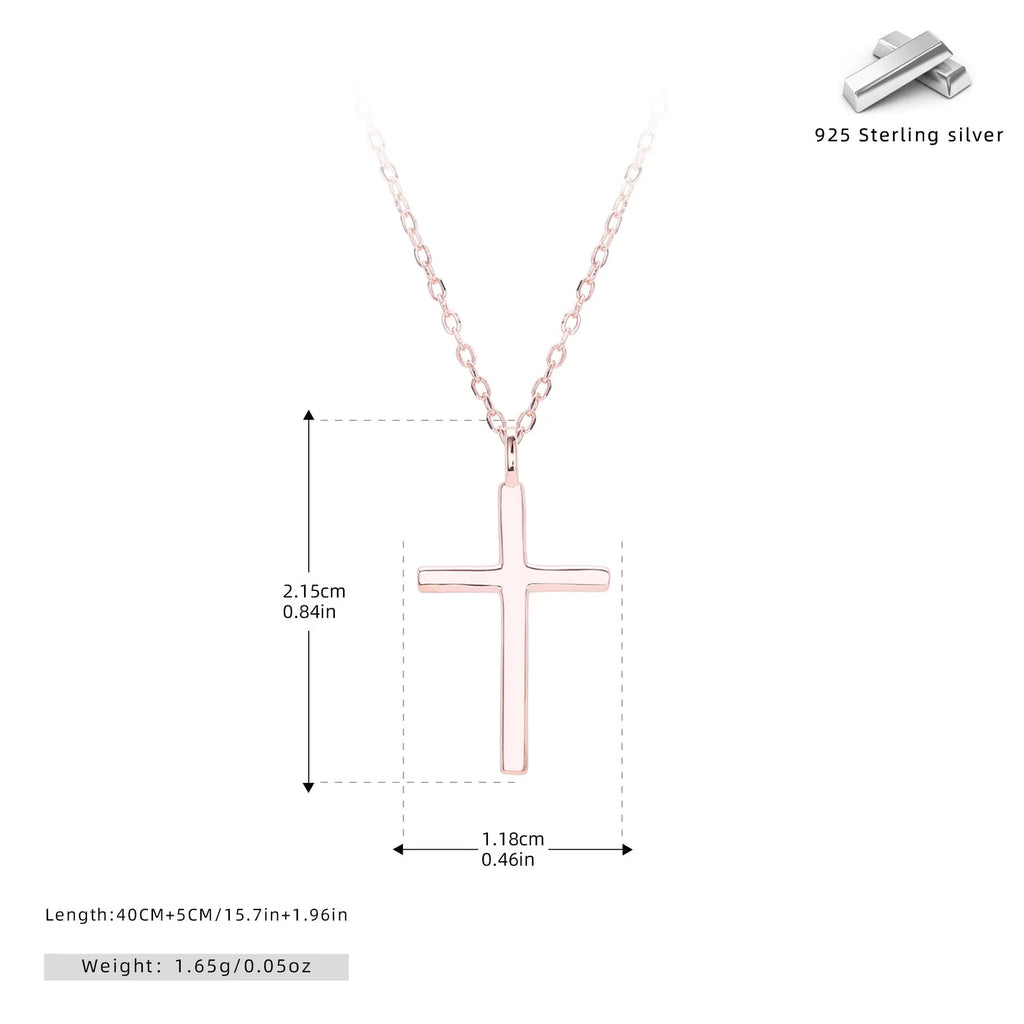 Simple glossy cross pendant on a sterling silver O-chain necklace, shown in gold, platinum, and rose gold finishes.