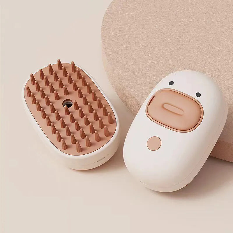 White rechargeable steam pet brush with rubber comb teeth and water tank for dog and cat grooming