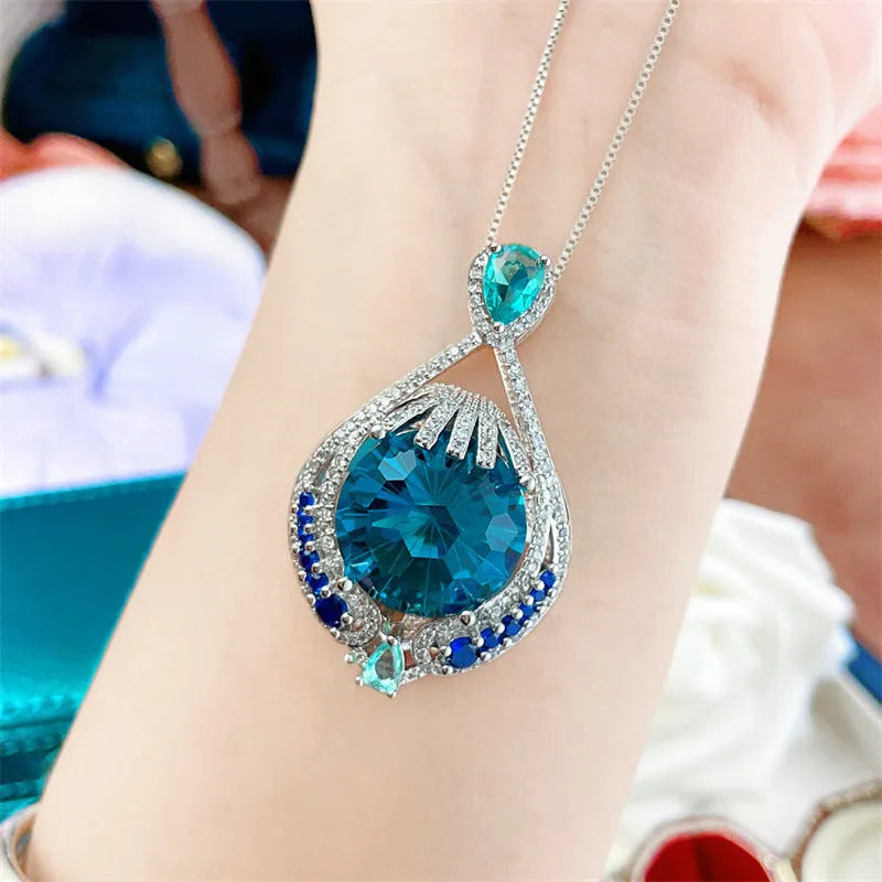 Women's geometric blue crystal pendant necklace with water wave chain