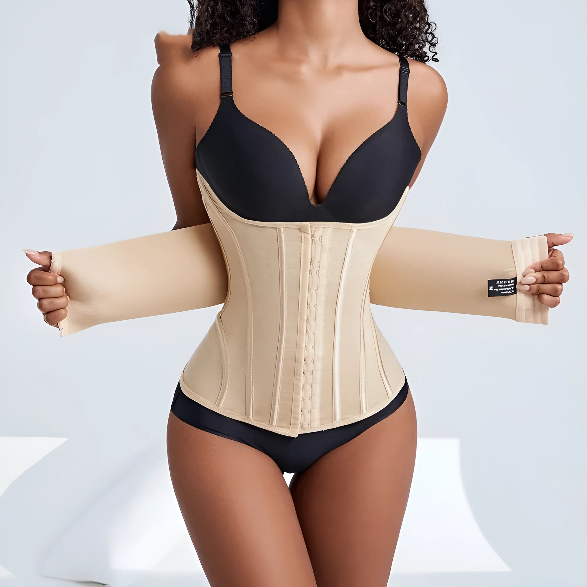 Nylon belly band waist trainer in apricot and black colours with belt tie