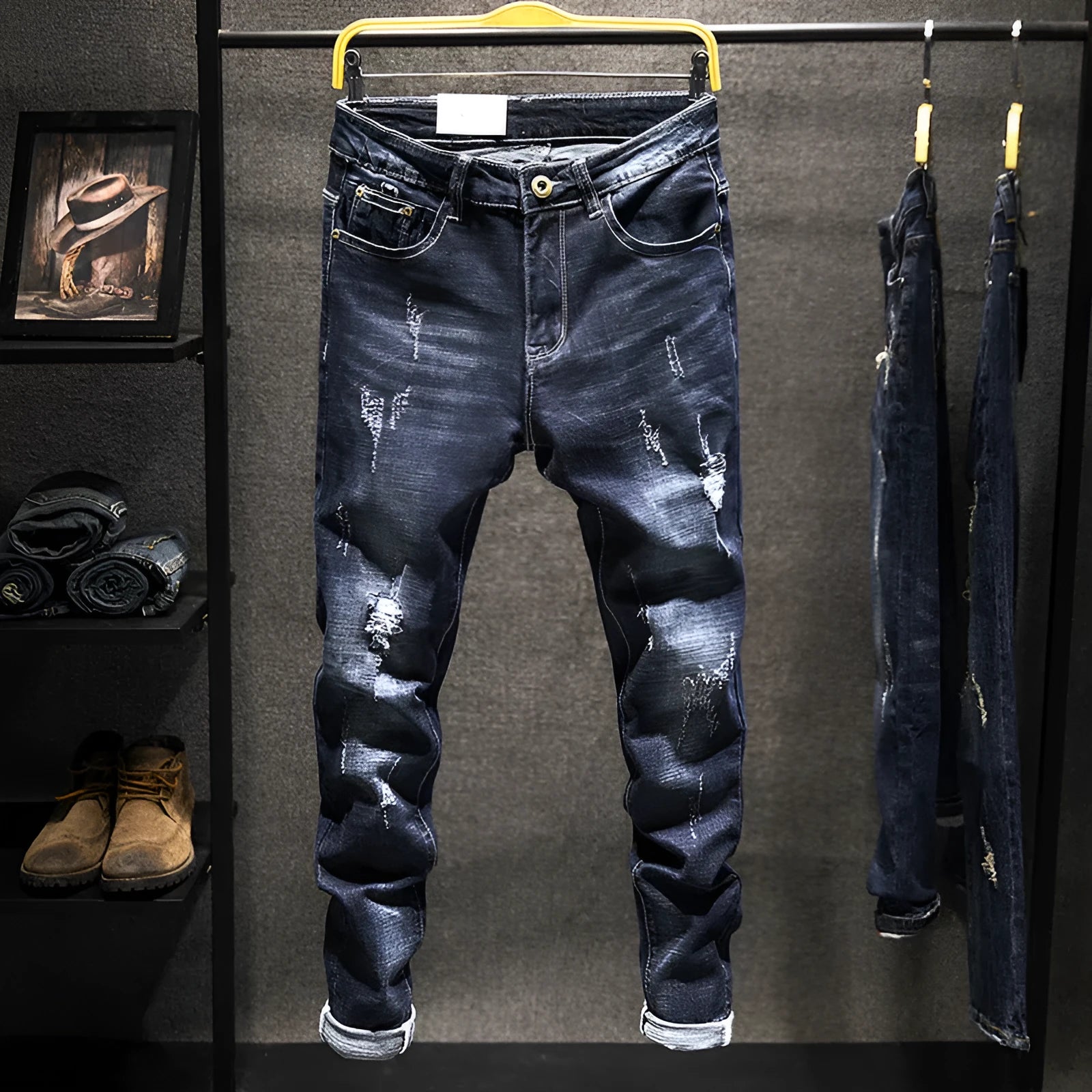 Men's slim-fit skinny jeans in dark blue denim fabric with a mid-rise waist
