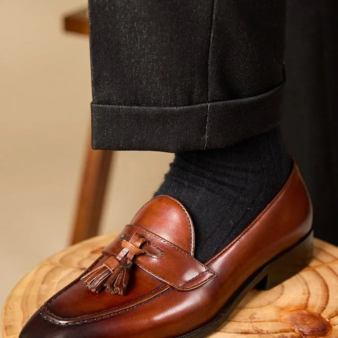 Genuine leather tassel loafers in British style with polished uppers and rubber soles