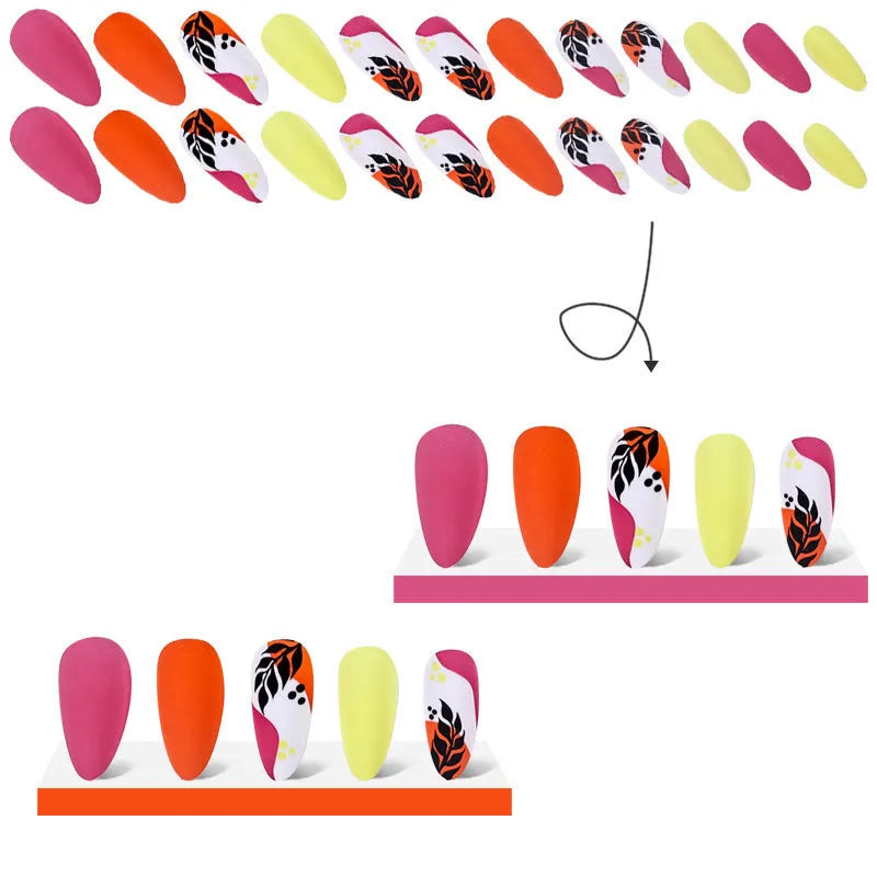 Wear Armour medium almond shaped nail stickers in four frosted patterns: French leaves, leopard print, macarons, and colour plating.