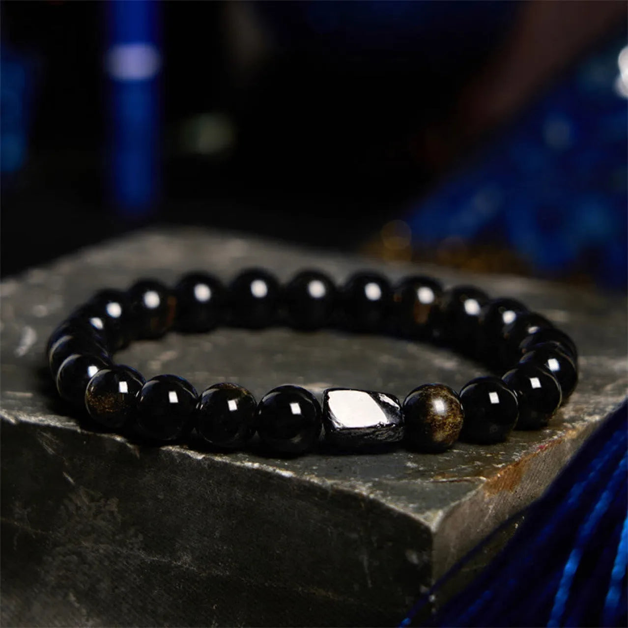 Natural obsidian stone bead bracelet with constellation design in 8mm size on wrist