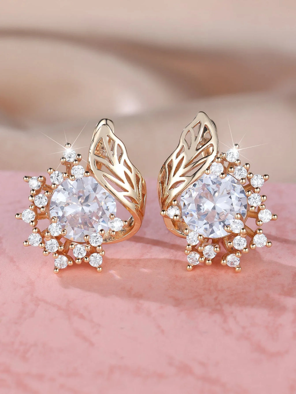 Round flower feather design earrings with champagne gold setting and coloured zircon stones.