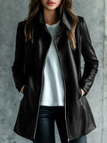 Black medium-length leather jacket for women with long sleeves.