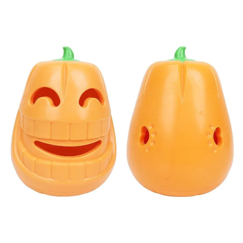 Orange Halloween pumpkin shaped dog chew toy with treat dispensing funnel opening