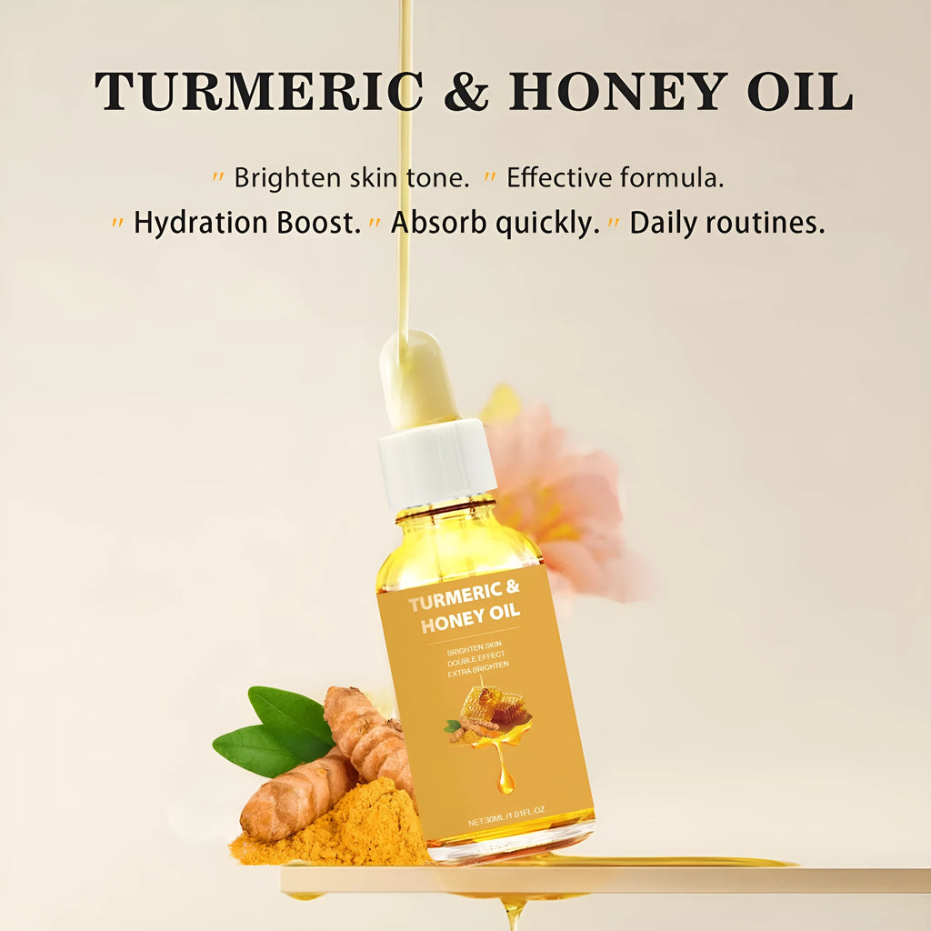 30ml glass bottle of turmeric honey essential oil with a dropper on a wooden surface.
