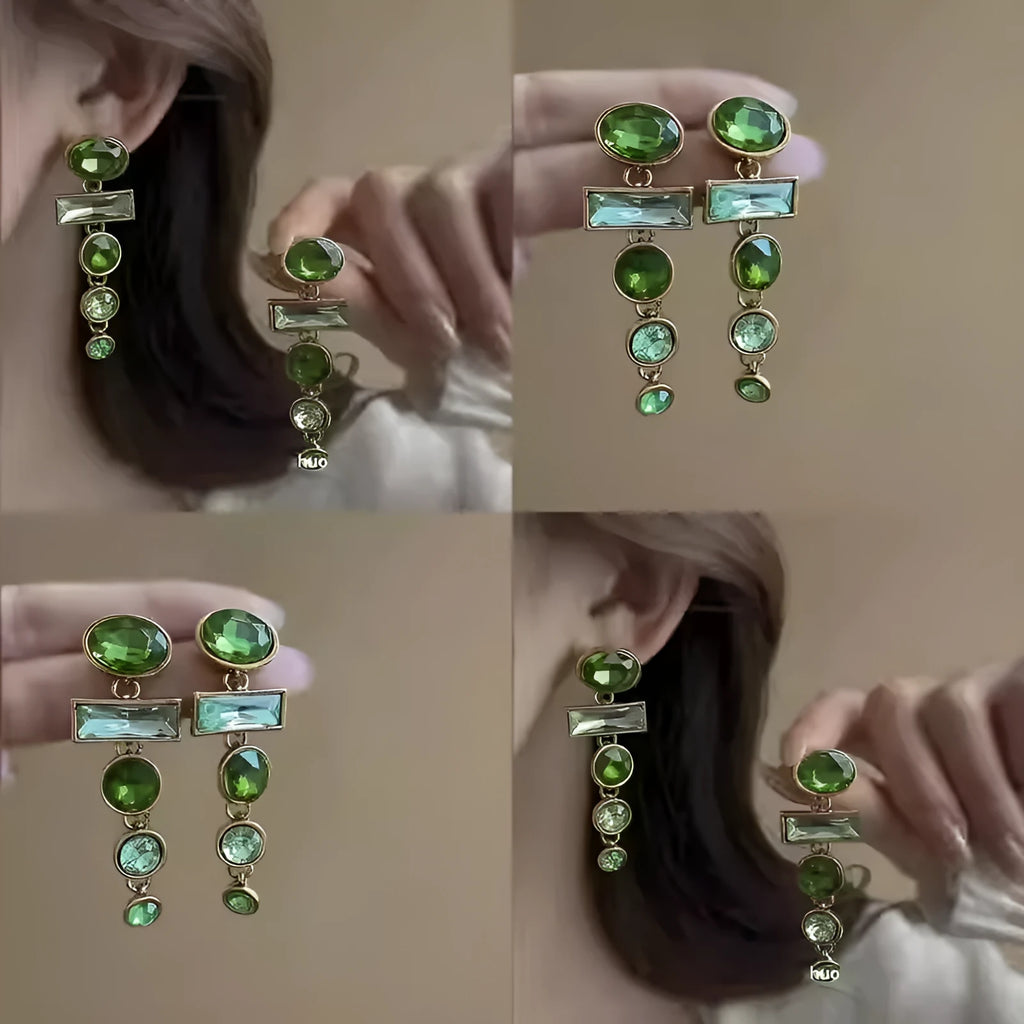 A pair of green gradient geometric alloy earrings with tassels and a zircon stone, shown on a white background.
