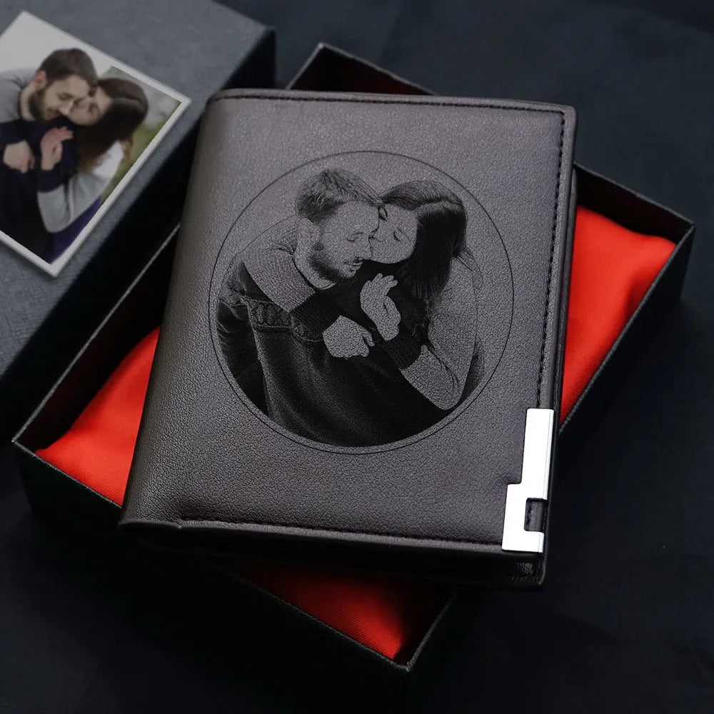 Men's leather wallet with a zipper closure, presented in individual packaging.