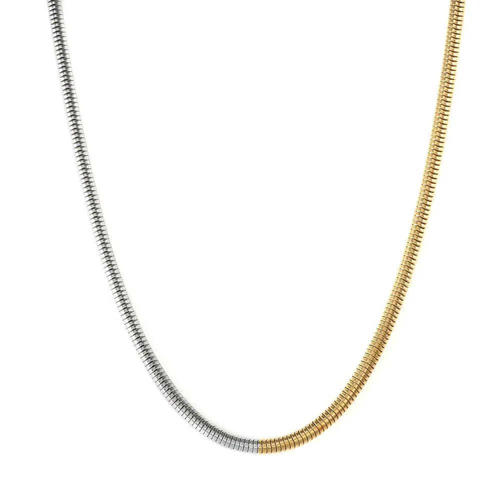 Gold-toned women's snake bones chain necklace with 3mm thick geometric links.