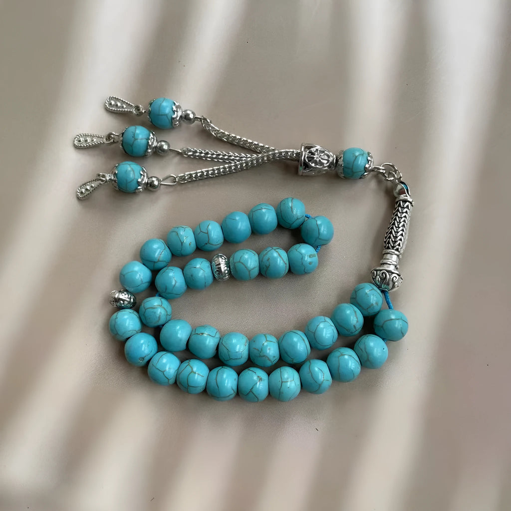 Sky blue stone Muslim prayer bracelet with 8mm spherical beads on wrist