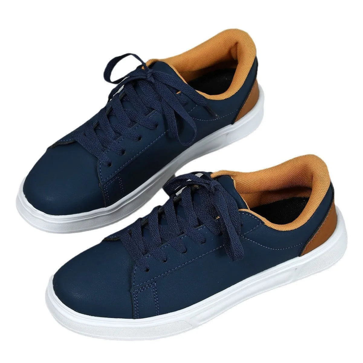Beige brown casual platform sneakers with cross strap detail and rubber sole.