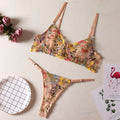 Women's floral bikini underwear set in polyester fabric showing colour options including skin, purple, black, yellow, pink