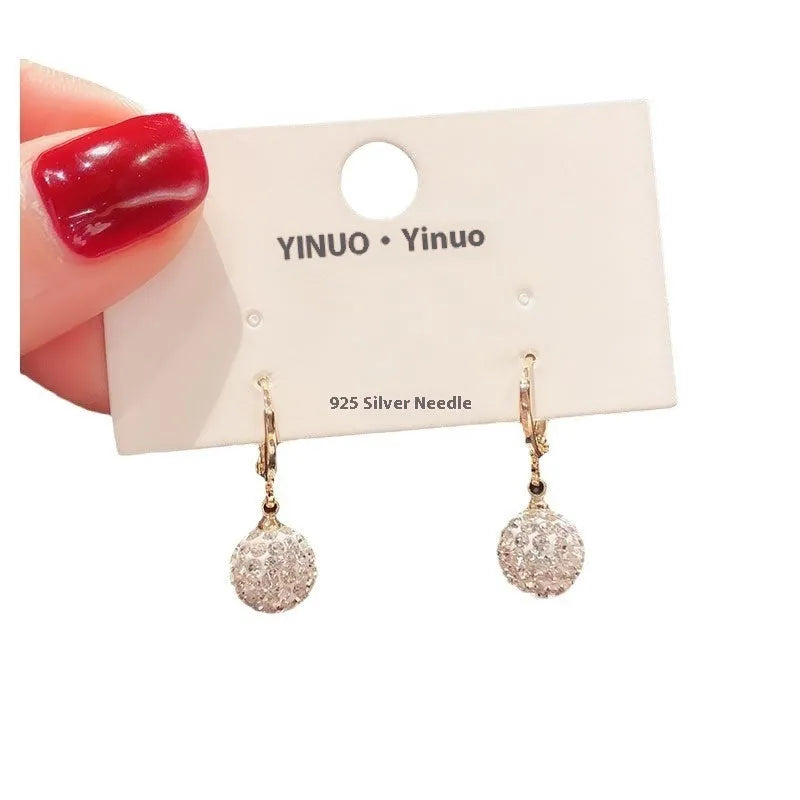 Women's copper geometric earrings with electroplated zircon finish in multiple colour variations