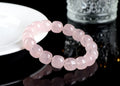 Pink crystal barrel bead bracelet with geometric design and 11-12mm beads