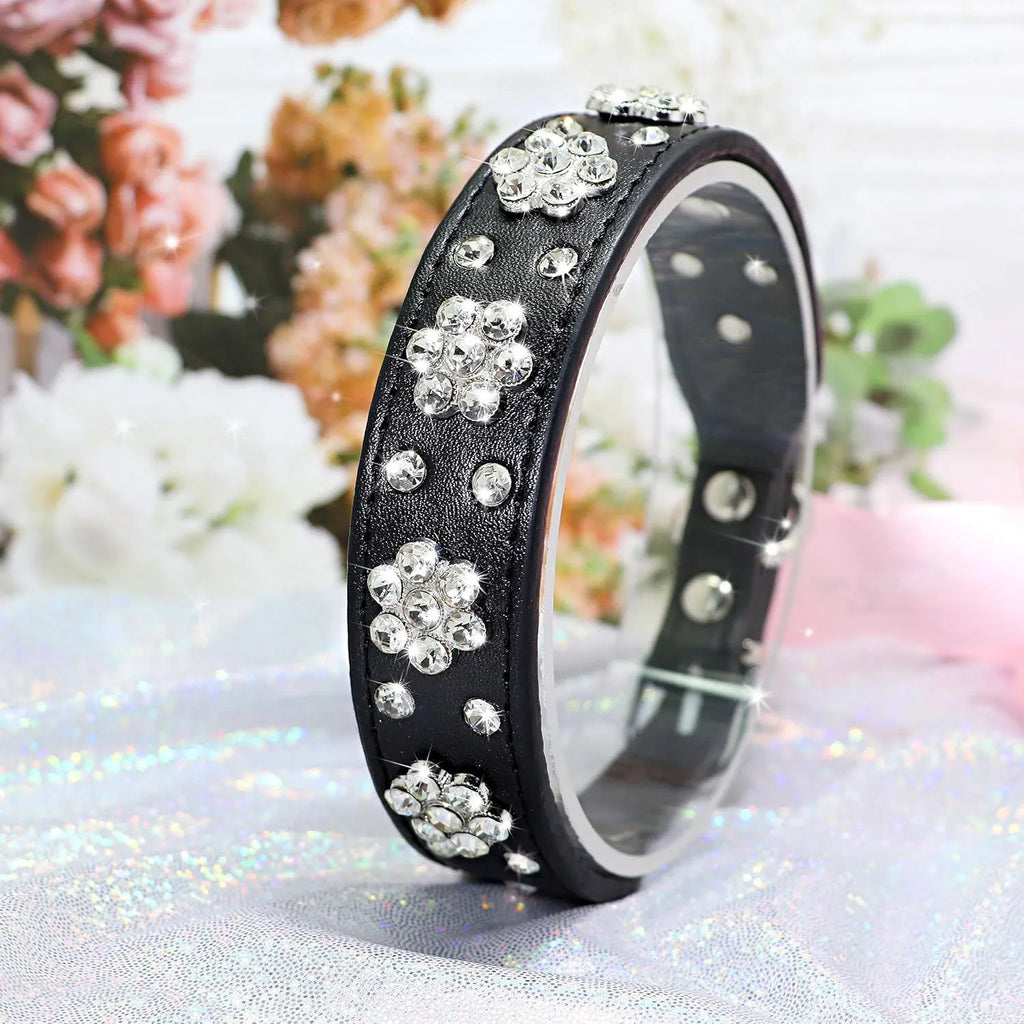 PU leather dog collar with rhinestone flower patterns and metal studs in adjustable sizes