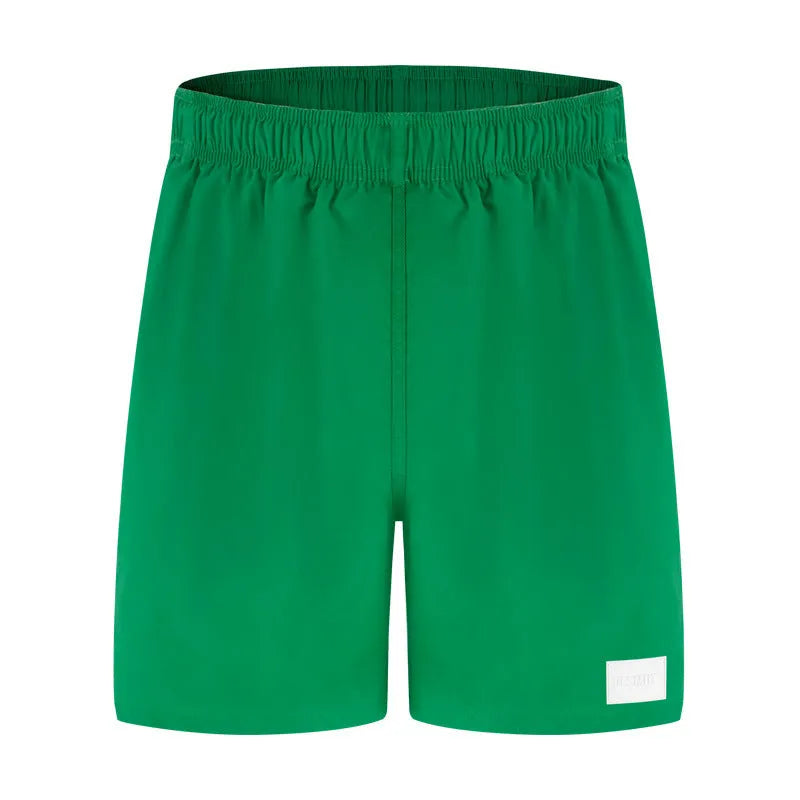 Men's quick-dry nylon sports shorts in blue with straight leg opening