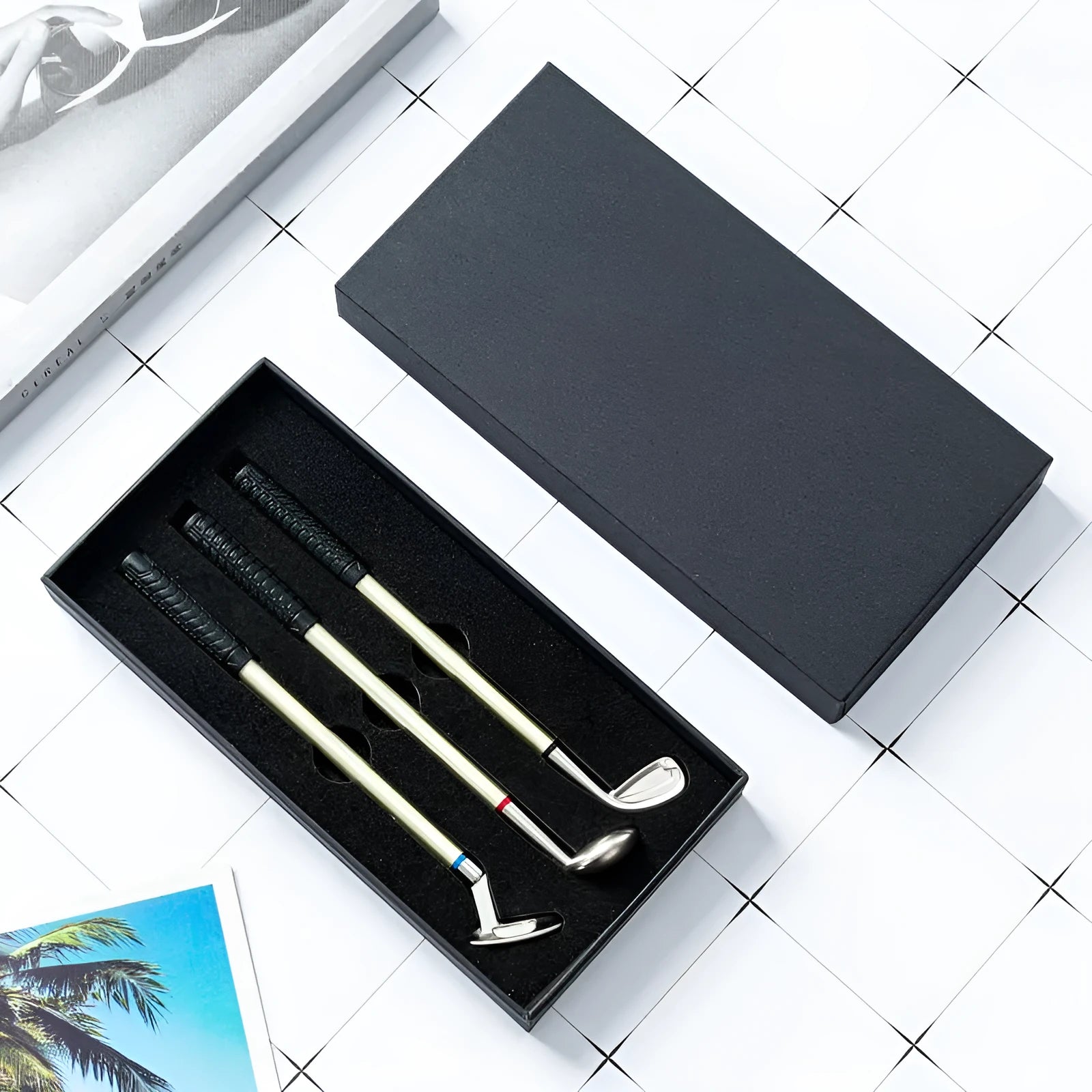 Three metal ballpoint pens with golf suit design showing 0.7mm bullet-type pen heads