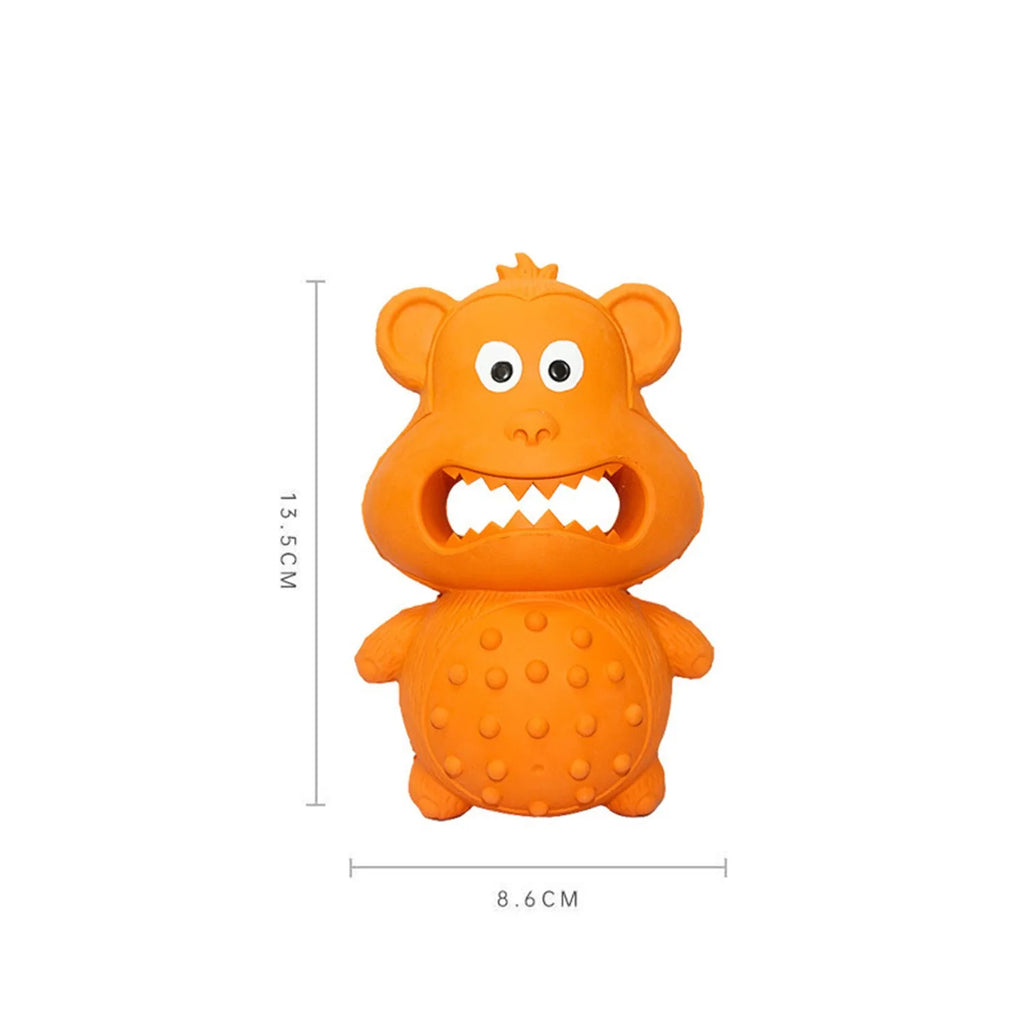 Green and yellow natural rubber dog toy for aggressive chewers with squeaker and treat hole.