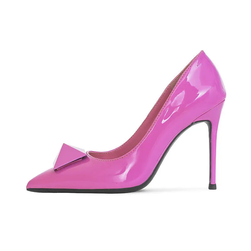 Pink patent leather women's stiletto heels with pointed toes and buckle fastening
