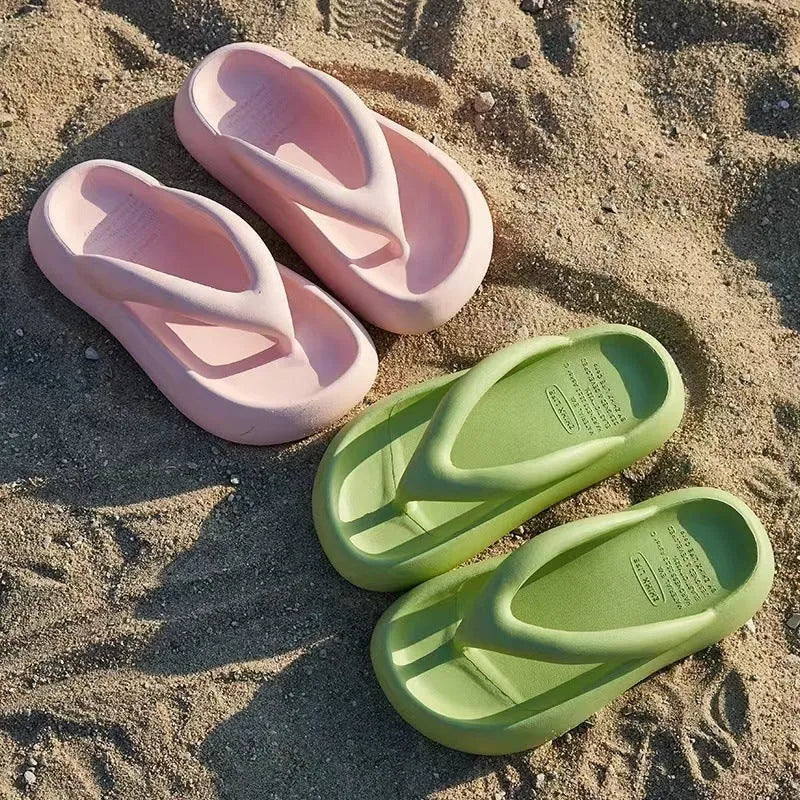 Solid colour EVA flip-flops with thick wedge sole and decorative bow detail