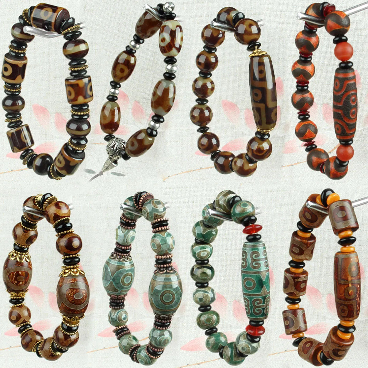 Close-up of a handmade Tibetan dzi bead bracelet with distressed agate beads in antique and frosted finishes.