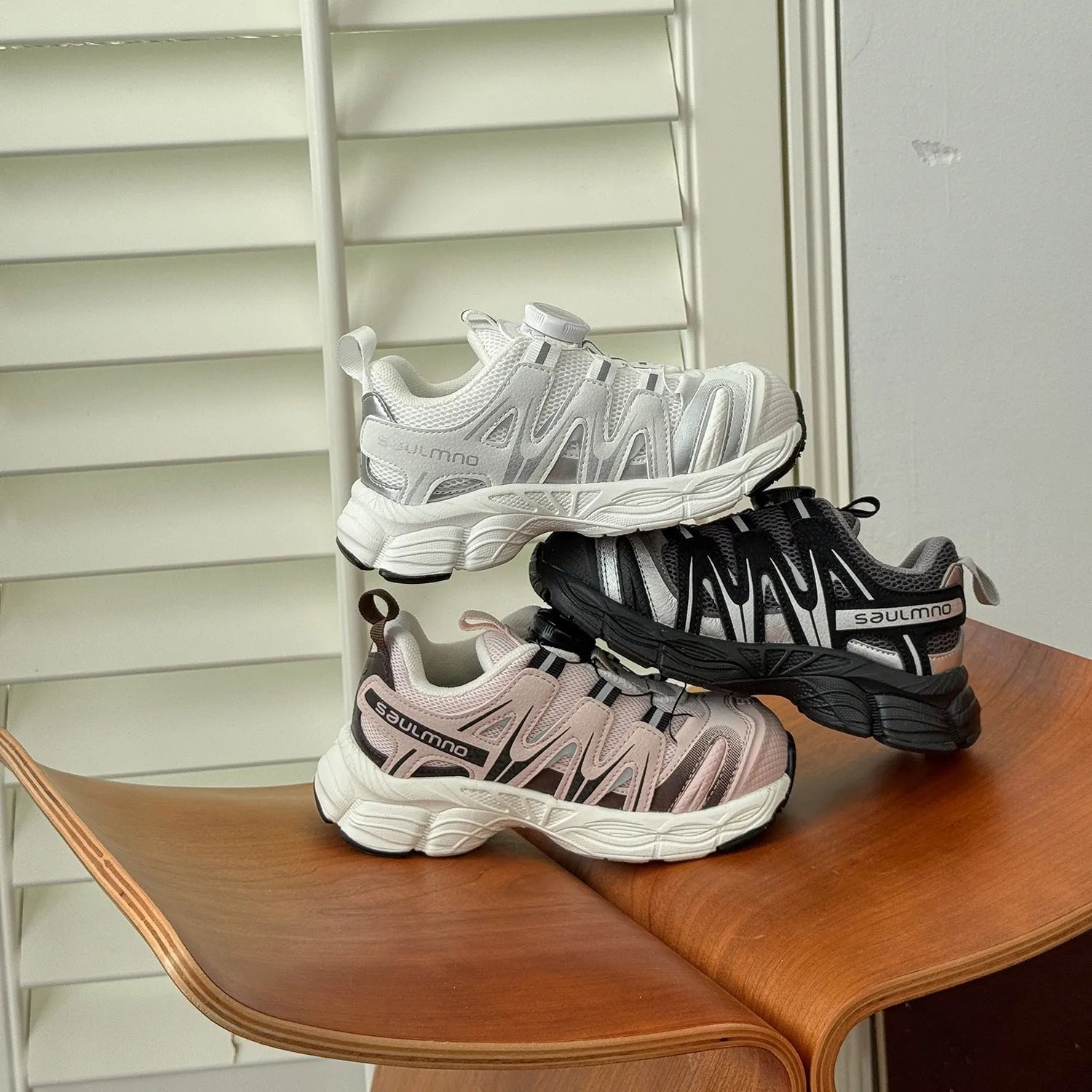 Lightweight breathable casual shoes in beige, black, and pink colours.