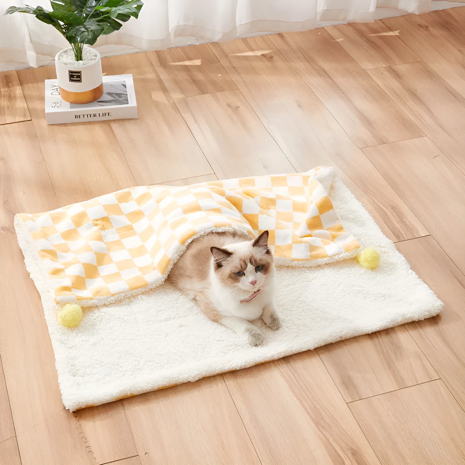 Green plaid pattern pet blanket with decorative fur balls for cats and dogs