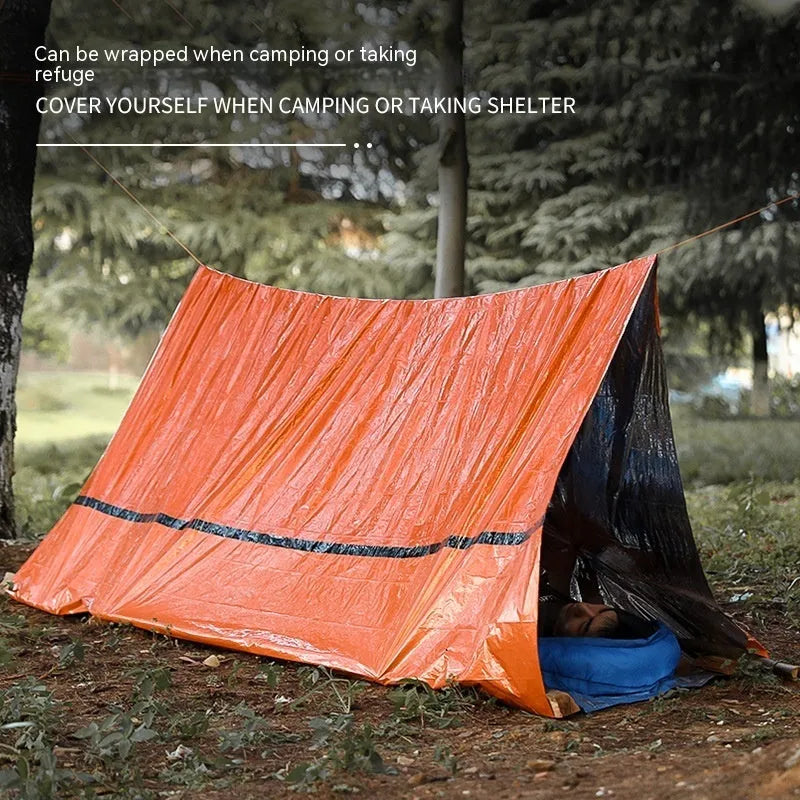 Orange portable disaster relief tent with sleeping bag emergency shelter kit