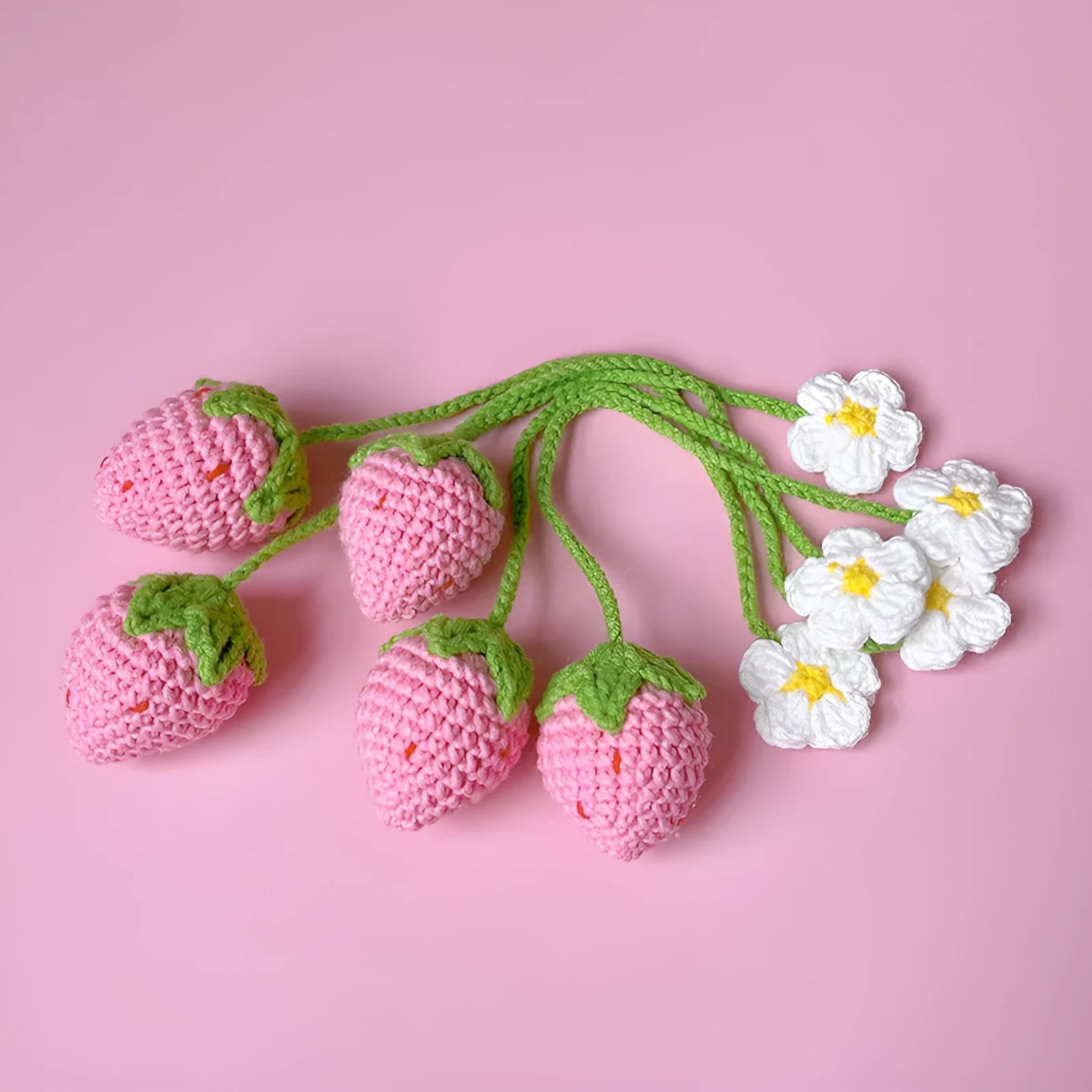 Handmade red and pink wool crochet strawberry pendant necklace on a 35cm cord