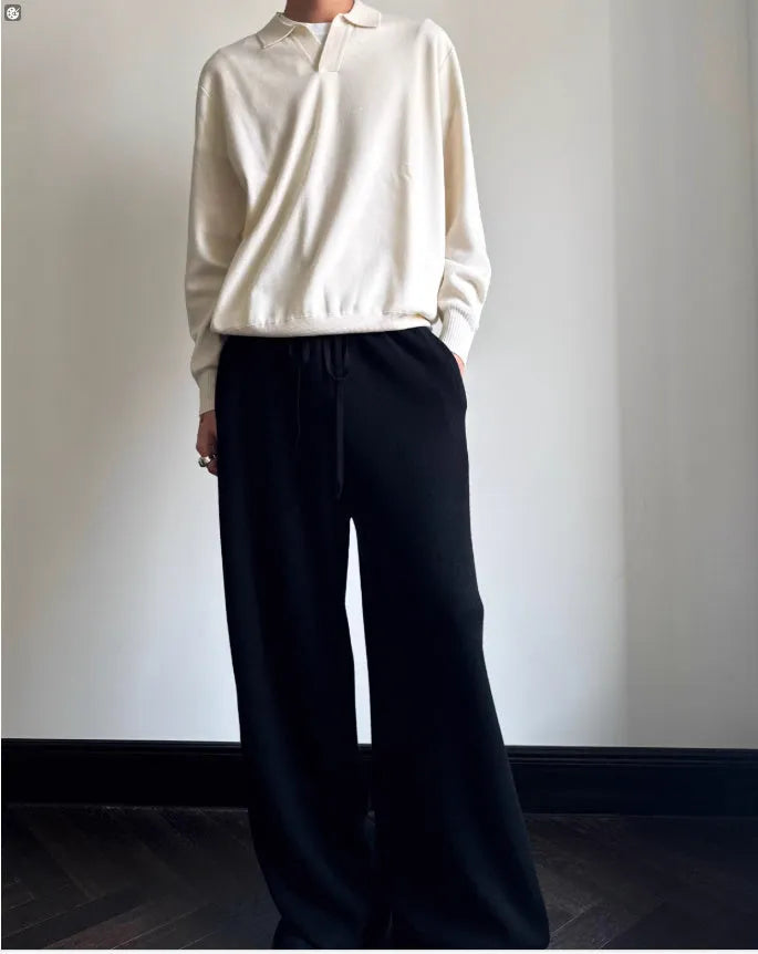 Pure wool polo neck sweater with lapel collar in loose fit, shown in milky white.