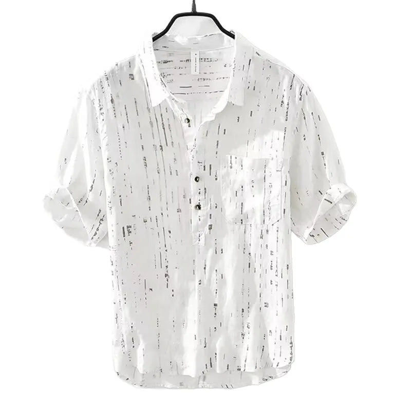 Men's loose fit short sleeve polo shirt in black, shown on a hanger.