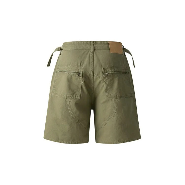Loose fit retro shorts in washed cotton cloth, shown in grey, green, camouflage, and blue colour options.
