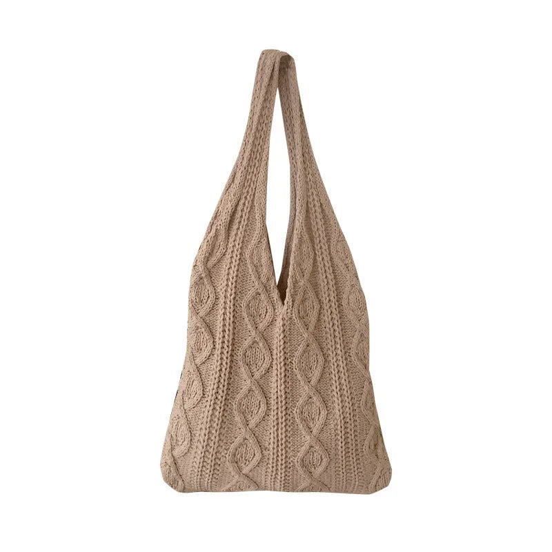 Large retro hollow knitted wool tote bag in a solid colour with double shoulder straps.