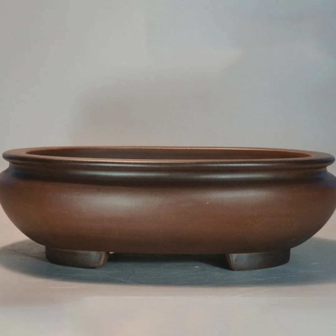 Handmade classical purple clay sand flowerpot on a desktop, showing its 58cm length and 18cm height.