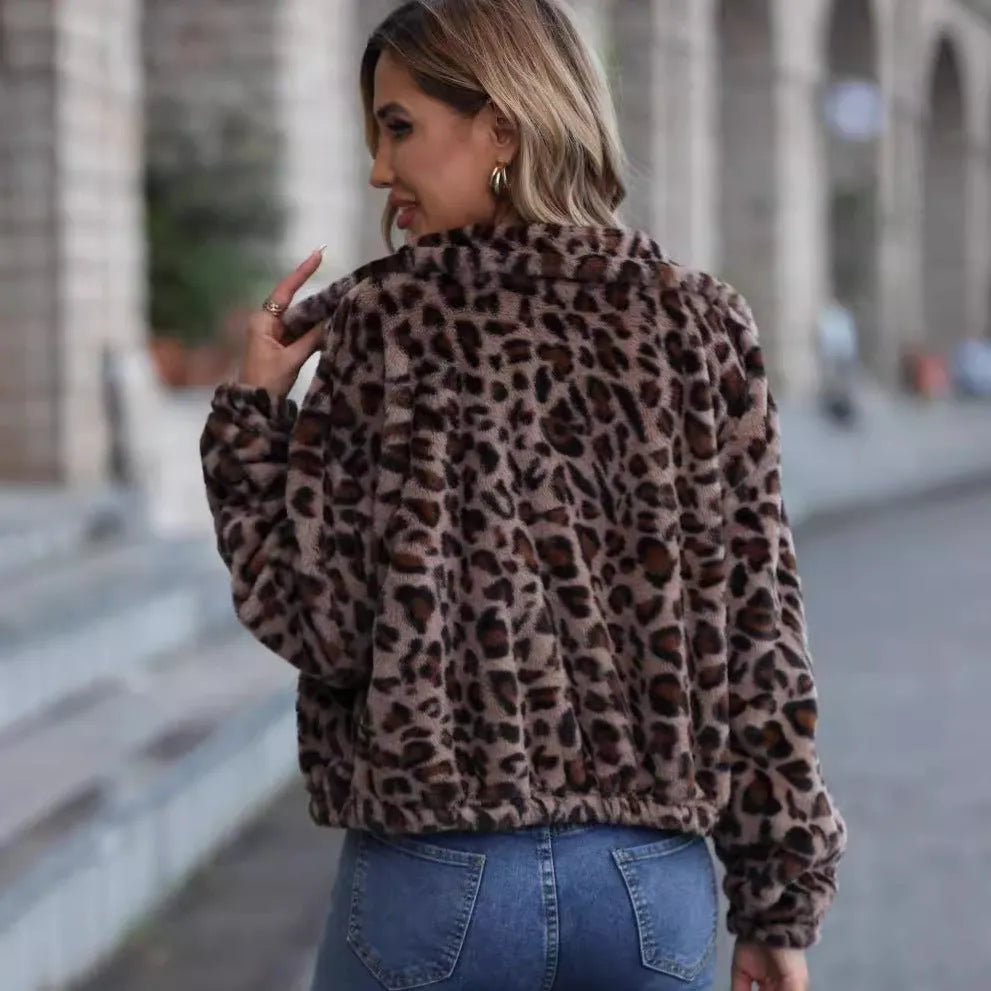 Women's loose leopard print plush coat with zipper and long raglan sleeves.