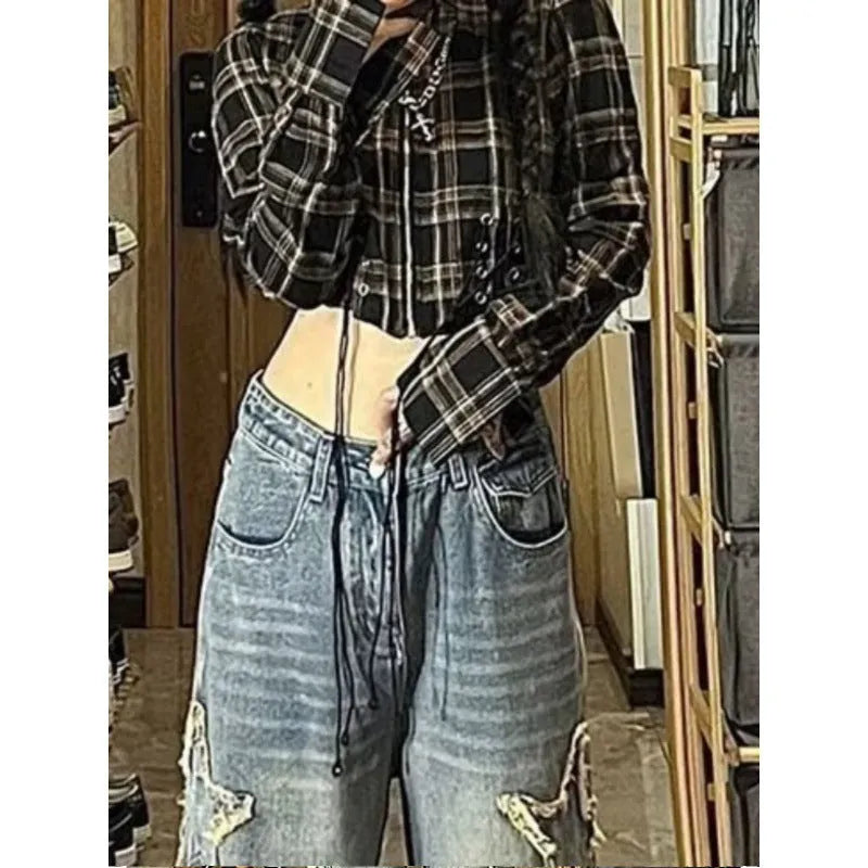 Blue cotton denim wide-leg high waist pants laid flat showing straight leg cut