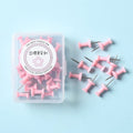 Boxed set of macaron-coloured plastic push pins in cherry blossom pink, mint green, and lavender, showing large and small sizes.