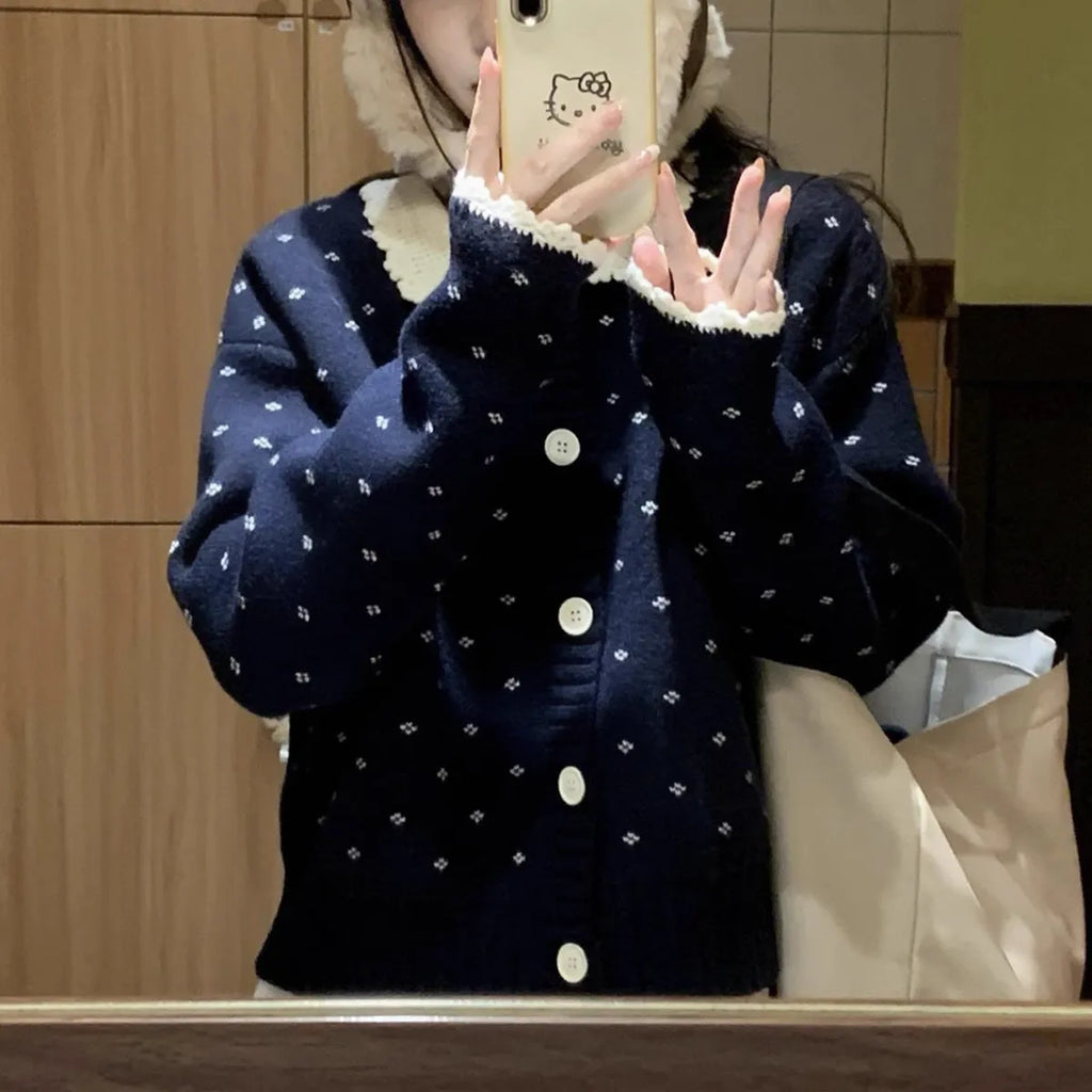 Knitted cardigan coat with Peter Pan collar in navy blue with floral pattern