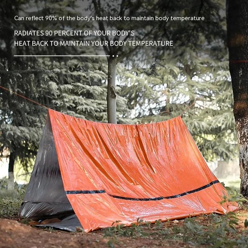 Orange portable disaster relief tent with sleeping bag emergency shelter kit