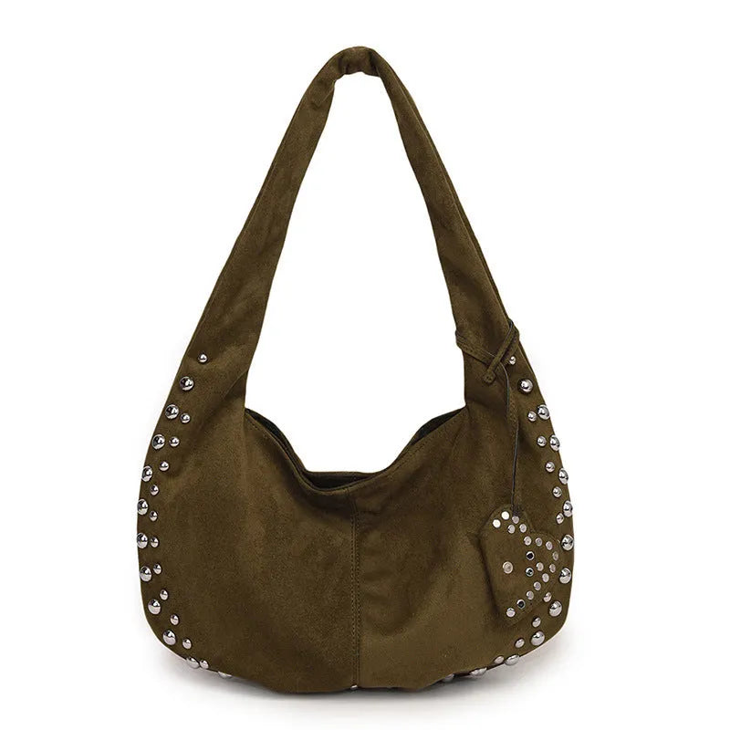 Soft plush retro style women's handbag in strapless tote design showing colour options