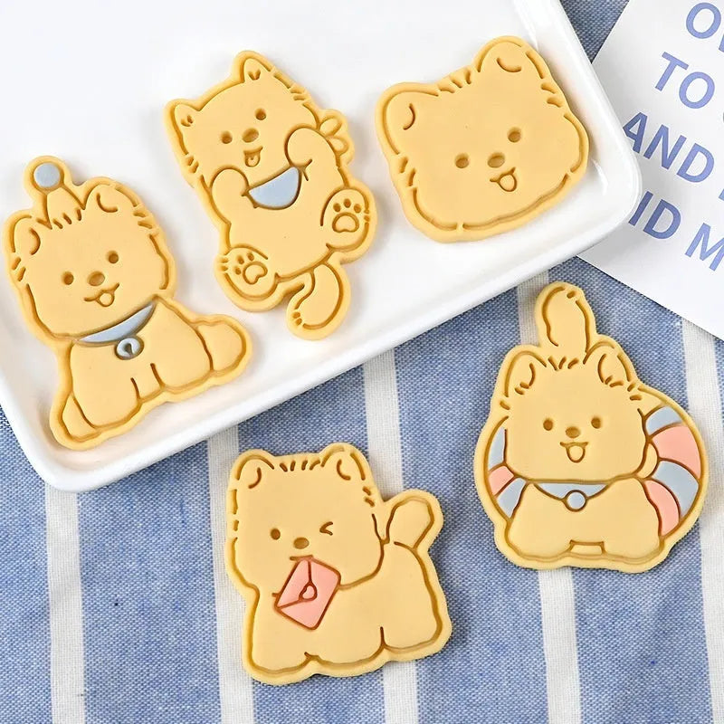 Three-dimensional plastic biscuit mould with dog-themed cartoon designs